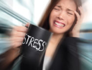 Stress – business person stressed at office. Business woman hold